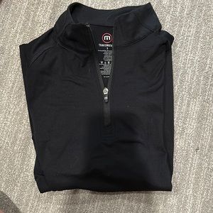 Travis Matthew’s half zip men’s golf jacket